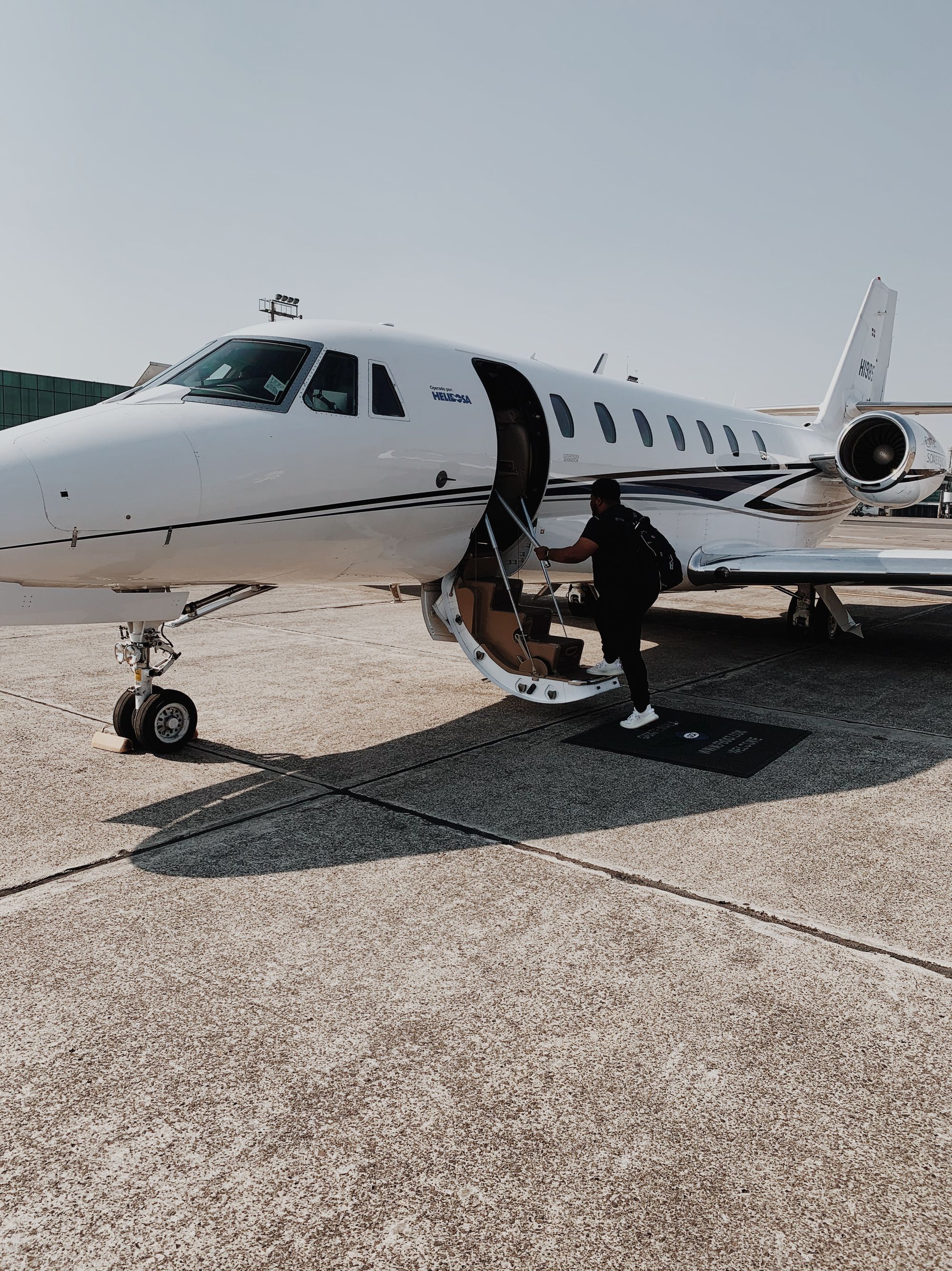 Passenger boarding a private jet